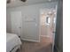 Hallway with view into loft area with a gate, perfect for an office or play area at 109 Auburn Crossing Dr, Auburn, GA 30011