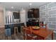 Open concept kitchen with island, stainless steel appliances, and adjacent dining area at 109 Auburn Crossing Dr, Auburn, GA 30011