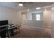 Versatile loft area perfect for an office or play area, featuring neutral decor and ample natural light at 109 Auburn Crossing Dr, Auburn, GA 30011
