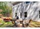 Relaxing backyard patio with comfortable seating and grill, perfect for outdoor entertaining at 2099 Easterwood Ter, Decatur, GA 30032
