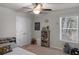 bedroom with decorated walls, built in storage, and natural light at 2099 Easterwood Ter, Decatur, GA 30032