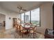 Elegant dining room with large window, classic furnishings, and a ceiling fan at 2828 Peachtree Nw Rd # 1501, Atlanta, GA 30305