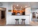 Stylish kitchen with granite counters, stainless steel appliances, and bar seating area at 2828 Peachtree Nw Rd # 1501, Atlanta, GA 30305