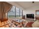 Cozy living room with city views, comfortable seating, and stylish decor at 2828 Peachtree Nw Rd # 1501, Atlanta, GA 30305
