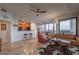 Open-concept living area with kitchen, dining space, and city views from large windows at 2828 Peachtree Nw Rd # 1501, Atlanta, GA 30305