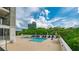 Outdoor pool area with lounge chairs, lush greenery, and views of the surrounding city skyline at 2828 Peachtree Nw Rd # 1501, Atlanta, GA 30305