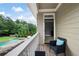 Balcony with views of the pool and backyard at 440 Scott Farm Dr, Powder Springs, GA 30127