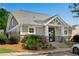 Charming community clubhouse with stone accents and manicured landscaping, offering amenities for residents at 562 Poplar Bnd, Canton, GA 30114