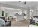 Open-concept kitchen offers a breakfast bar and modern appliances at 562 Poplar Bnd, Canton, GA 30114