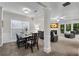 Open concept living and dining area filled with natural light at 562 Poplar Bnd, Canton, GA 30114