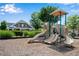 Community playground with slides, climbing structures, and shaded seating for  at 562 Poplar Bnd, Canton, GA 30114