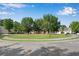 Neighborhood roundabout featuring a grassy median at 562 Poplar Bnd, Canton, GA 30114