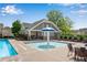 Shallow splash pool with umbrella fountain and lounge seating at 562 Poplar Bnd, Canton, GA 30114