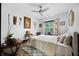 Well-lit bedroom features a queen bed, neutral walls, and wood furniture at 1250 Parkwood Se Cir # 3001, Atlanta, GA 30339
