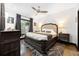 Serene bedroom with a plush bed, modern ceiling fan, and elegant decor at 1250 Parkwood Se Cir # 3001, Atlanta, GA 30339
