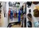 Walk-in closet with clothing racks, shelves, hats and shoes at 1250 Parkwood Se Cir # 3001, Atlanta, GA 30339
