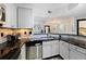 Bright kitchen with stainless steel appliances, subway tile backsplash, and a breakfast bar at 1250 Parkwood Se Cir # 3001, Atlanta, GA 30339