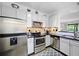 This modern kitchen features stainless appliances, sleek countertops, and ample cabinet space at 1250 Parkwood Se Cir # 3001, Atlanta, GA 30339