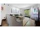 Bright and spacious living room with large windows and stylish decor at 1250 Parkwood Se Cir # 3001, Atlanta, GA 30339
