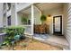 Charming patio with an outdoor bar, beautiful plants, and elegant decor, perfect for relaxing and entertaining at 1250 Parkwood Se Cir # 3001, Atlanta, GA 30339
