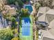 Aerial view showcasing the tennis court and nearby pool amenities within the residential community at 1250 Parkwood Se Cir # 3001, Atlanta, GA 30339