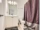 Bathroom with a shower, vanity, and grey rugs at 2543 Oakbourne Ln # 14, Smyrna, GA 30080
