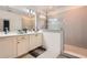 Bright bathroom with walk in shower, double sinks and large mirrors at 2543 Oakbourne Ln # 14, Smyrna, GA 30080