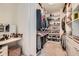 Well-organized walk-in closet with built in shelving, lighting and vanity area at 2543 Oakbourne Ln # 14, Smyrna, GA 30080