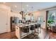 Spacious kitchen with stainless appliances, granite island and counter seating at 2543 Oakbourne Ln # 14, Smyrna, GA 30080