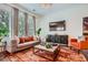 Comfortable living room with large windows, a plush sofa, and stylish decor at 2543 Oakbourne Ln # 14, Smyrna, GA 30080