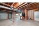 Unfinished basement with exposed ceiling, concrete floor, and visible utilities at 465 Willowbrook Se Dr, Smyrna, GA 30082