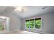 Bright bedroom featuring a ceiling fan, natural light, and a calming neutral color palette at 465 Willowbrook Se Dr, Smyrna, GA 30082