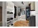 Well-organized closet with ample storage space and modern washer and dryer at 465 Willowbrook Se Dr, Smyrna, GA 30082
