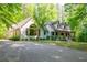 Charming home featuring an attached garage and well-manicured landscaping at 465 Willowbrook Se Dr, Smyrna, GA 30082