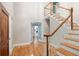 Entryway featuring hardwood floors, staircase and modern doors at 465 Willowbrook Se Dr, Smyrna, GA 30082