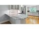 Modern kitchen featuring white cabinets, stainless steel appliances, and granite countertops at 465 Willowbrook Se Dr, Smyrna, GA 30082
