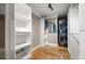 Neat laundry room with new front load washer and dryer and ample shelving for storage at 465 Willowbrook Se Dr, Smyrna, GA 30082