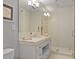 Stylish bathroom with marble countertops, a glass-enclosed shower, and modern fixtures at 1820 Peachtree St # 614, Atlanta, GA 30309
