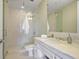 Bathroom featuring a glass walk-in shower with a light marble sink, modern and updated at 1820 Peachtree St # 614, Atlanta, GA 30309