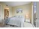 Relaxing bedroom with a full bed, art, and access to a modern bathroom, creating a comfortable private space at 1820 Peachtree St # 614, Atlanta, GA 30309