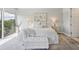 Inviting bedroom with large windows, neutral tones, and elegant furnishings at 1820 Peachtree St # 614, Atlanta, GA 30309