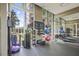 Bright gym offering weight training equipment, exercise machines, and mirrors at 1820 Peachtree St # 614, Atlanta, GA 30309