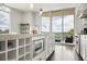 Contemporary kitchen with white cabinets, stainless steel appliances, and a large island with seating at 1820 Peachtree St # 614, Atlanta, GA 30309