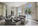 Bright living room with stylish seating, pool views, and elegant decor at 1820 Peachtree St # 614, Atlanta, GA 30309