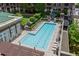 Rooftop pool with lounge chairs and well-kept landscaping at 1820 Peachtree St # 614, Atlanta, GA 30309