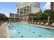 Beautiful pool area with clear blue water and comfortable lounge seating at 1820 Peachtree St # 614, Atlanta, GA 30309