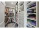 Custom walk-in closet features ample shelving and storage, perfect for organizing clothes and accessories at 1820 Peachtree St # 614, Atlanta, GA 30309