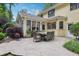 Exterior of a house featuring a flagstone patio area with an outdoor dining table at 3456 Drayton Ne Dr, Roswell, GA 30075
