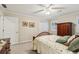 Comfortable bedroom featuring neutral walls, carpet, and shuttered windows at 3456 Drayton Ne Dr, Roswell, GA 30075