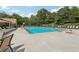 Spacious outdoor community pool with lounge chairs and ample seating for residents to enjoy at 3456 Drayton Ne Dr, Roswell, GA 30075